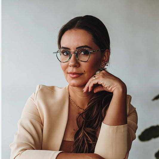 Model wearing Barledear Meadow Mosaic Green eyeglasses in a lifestyle portrait