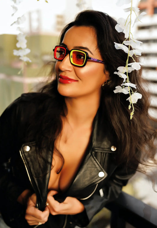 VoyueLens geometric eyeglasses in Black Amber color, model wearing this variant styled in modern fashion.