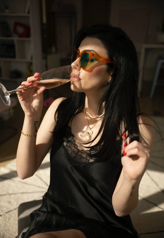 lifestyle image of model wearing VoyueLens amber yellow square sunglasses for weekend fashion style
