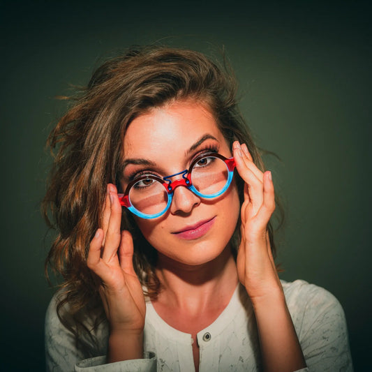 Model wearing VoyueLens VL19244 Crimson Blue Fusion acetate eyeglasses with a street-style fashion look for small faces