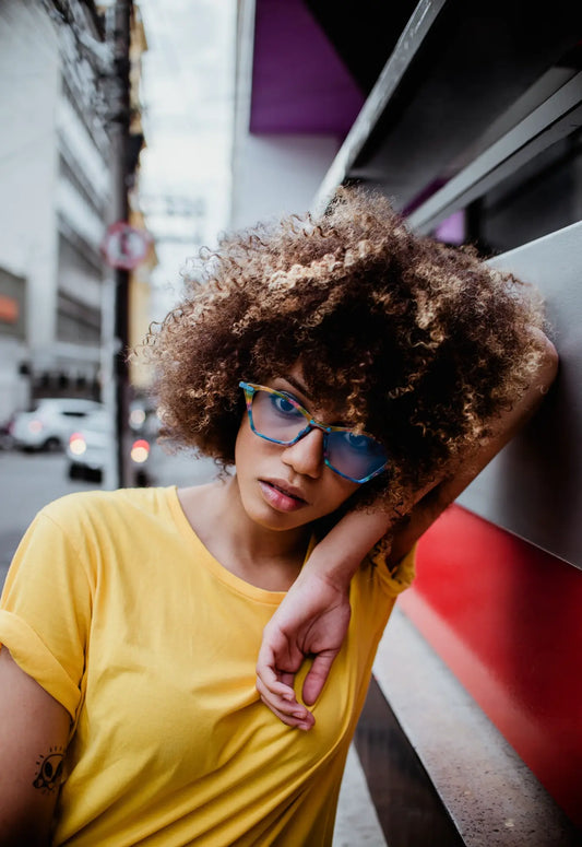 Model wearing VoyueLens ColorPop Cat-Eye Eyeglasses in Ocean Spectrum, showcasing the statement-making, vintage-inspired style perfect for fashion or prescription use.