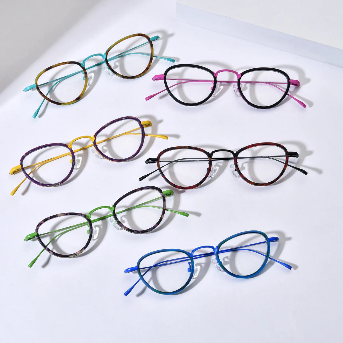 Barledear geometric acetate titanium eyeglasses collection group image showing Sunlit Teal Tortoise Midnight Rose Violet Sunshine Crimson Noir Meadow Violet and Ocean Teal color variants