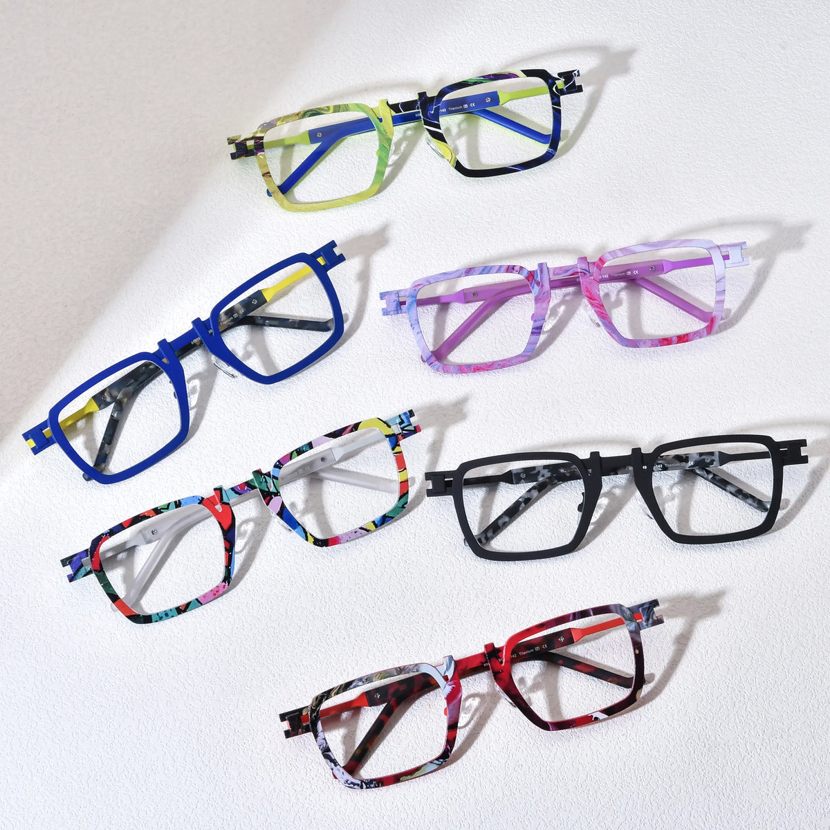 Barledear geometric square titanium eyeglasses collection group image showing Lime Cobalt Mosaic, Cobalt Lemon Mosaic, Lavender Rose Mosaic, Confetti White Mosaic, Onyx Smoke Marble, and Crimson Noir Mosaic color variants