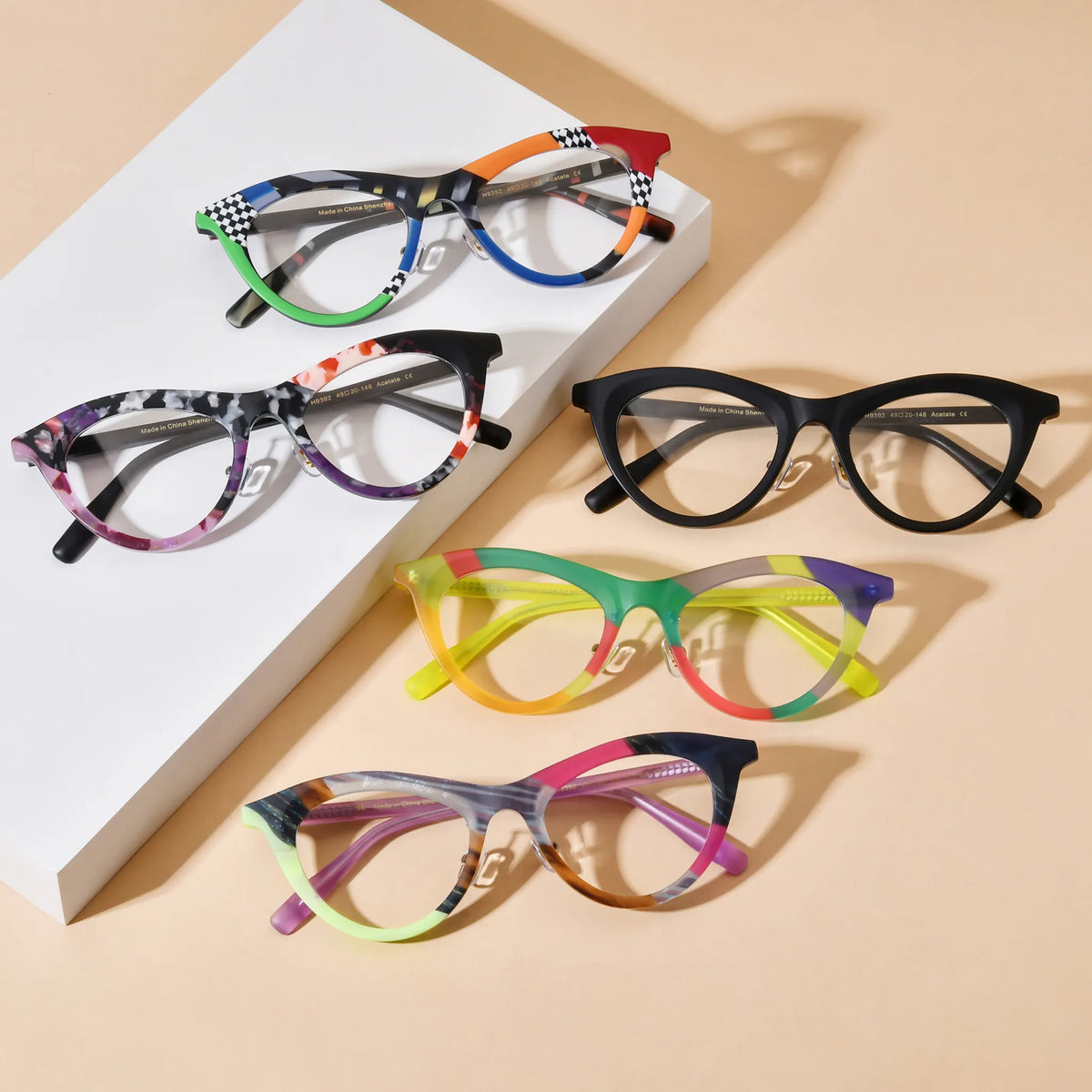 Barledear artistic cat-eye acetate eyeglasses collection showing Checker Clash, Midnight Matte, Plum Ember Mosaic, Citrus Carnival, and Neon Smoke Mosaic color variants
