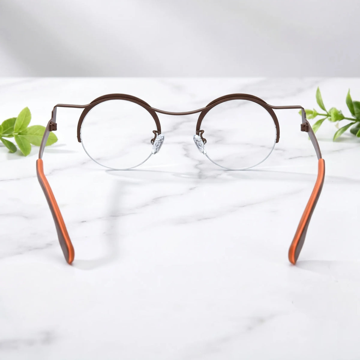 Barledear Amber Cocoa eyeglasses back view showing adjustable nose pads, slim temples, and comfortable frame structure