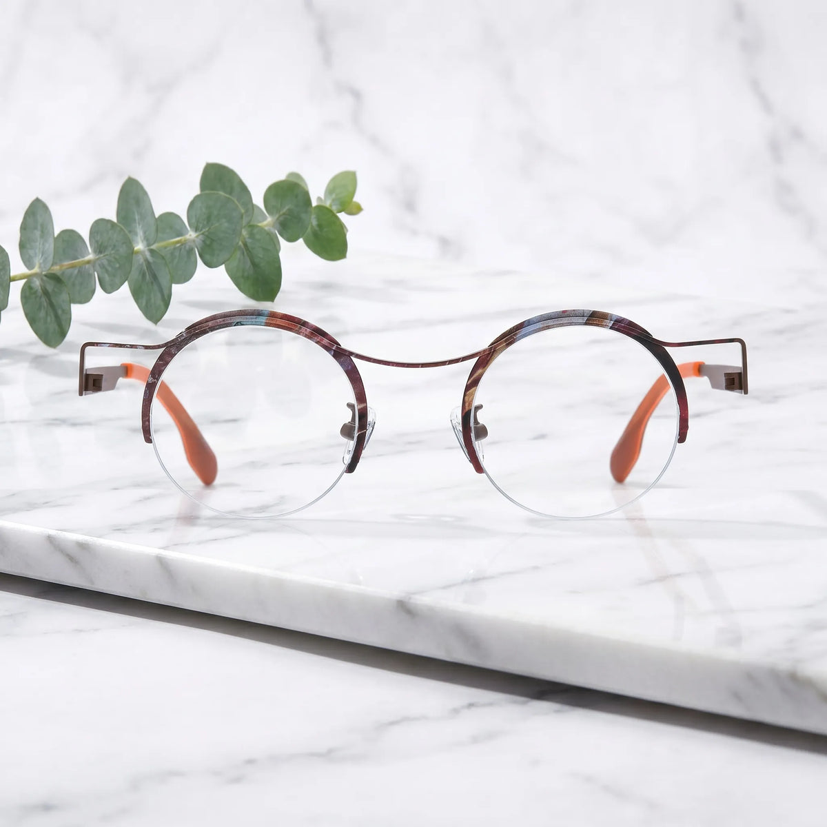 Barledear Amber Cocoa eyeglasses shown in a clean lifestyle front view with retro artistic round frame design