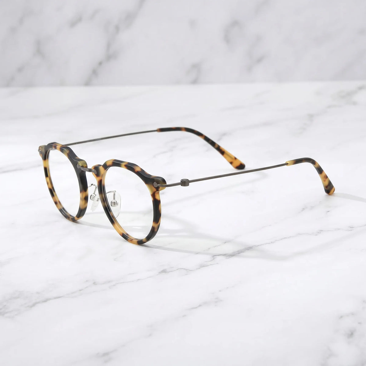 Barledear Amber Leopard eyeglasses angled side view showing slim wire temples adjustable nose pads and bridge detail