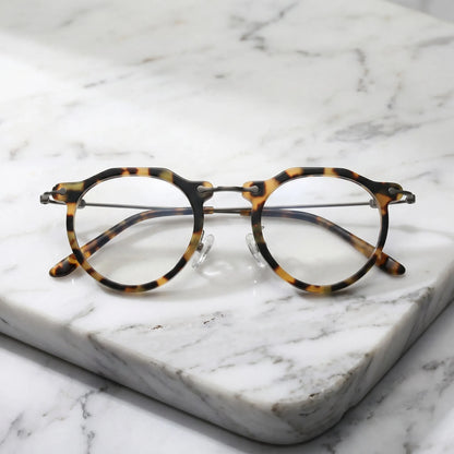 Barledear Amber Leopard eyeglasses folded display showing acetate front slim metal temples and acetate temple tips