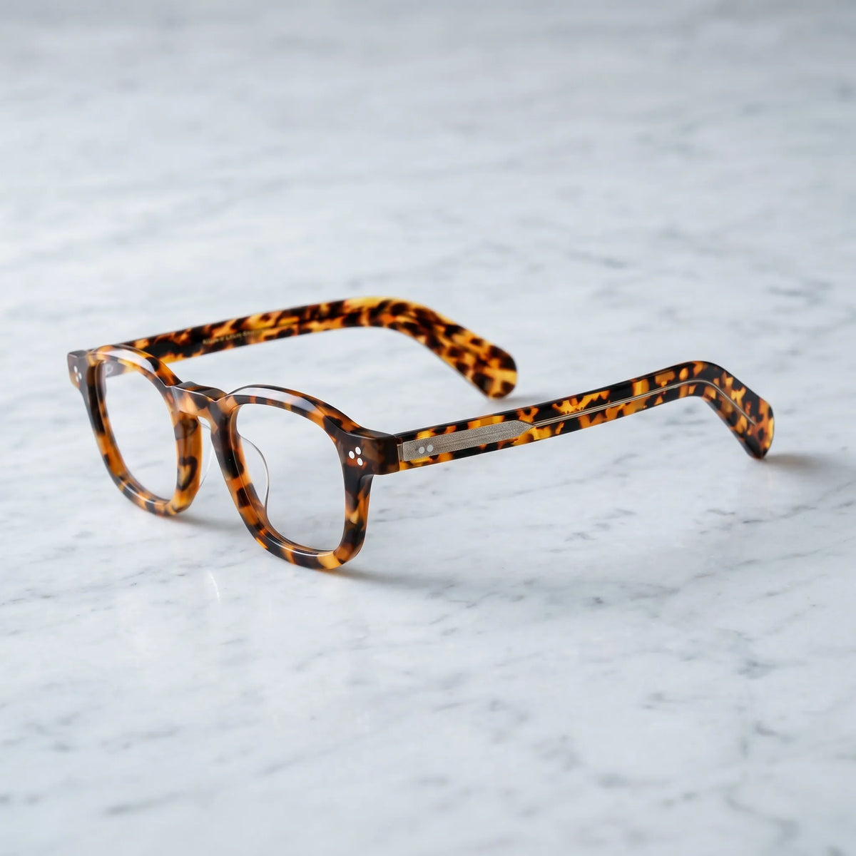 Barledear Amber Leopard Tortoise eyeglasses angled side view showing warm tortoise pattern and bridge detail