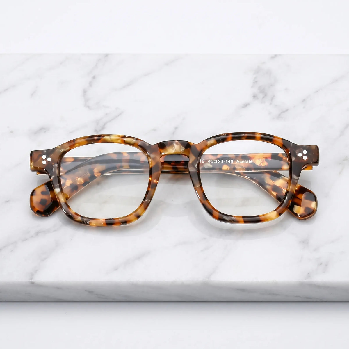 Barledear Amber Leopard Tortoise eyeglasses folded display showing full-rim acetate frame and patterned temple design