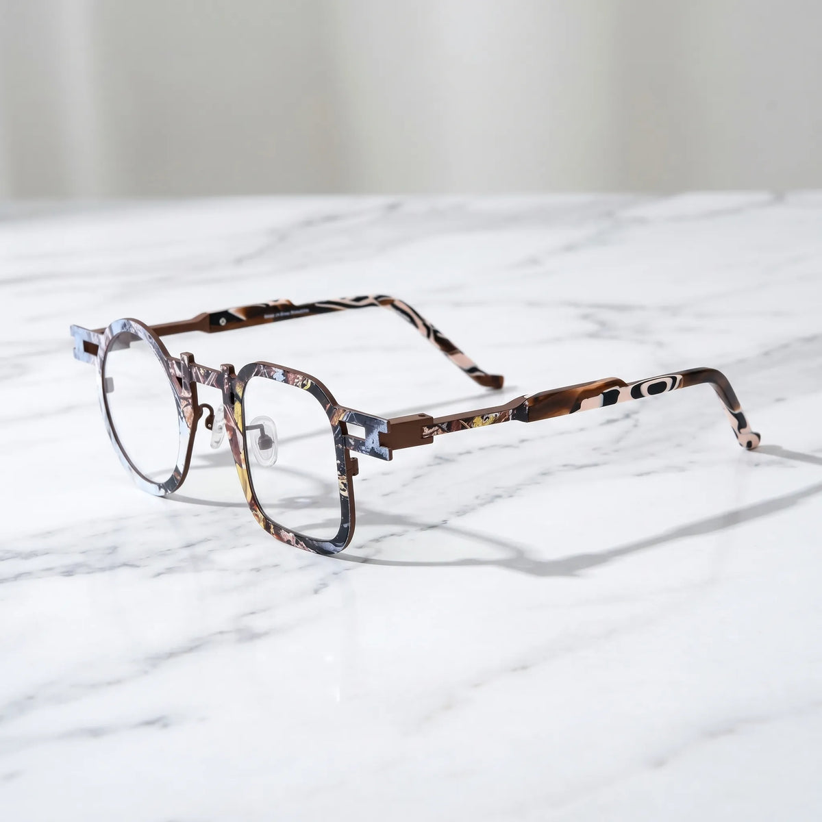 Barledear Amber Mosaic Brown eyeglasses angled side view showing slim temples, extended side-bar detail, and adjustable nose pads