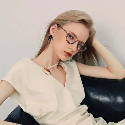 Model wearing Barledear Amber Mosaic Brown eyeglasses in a lifestyle portrait