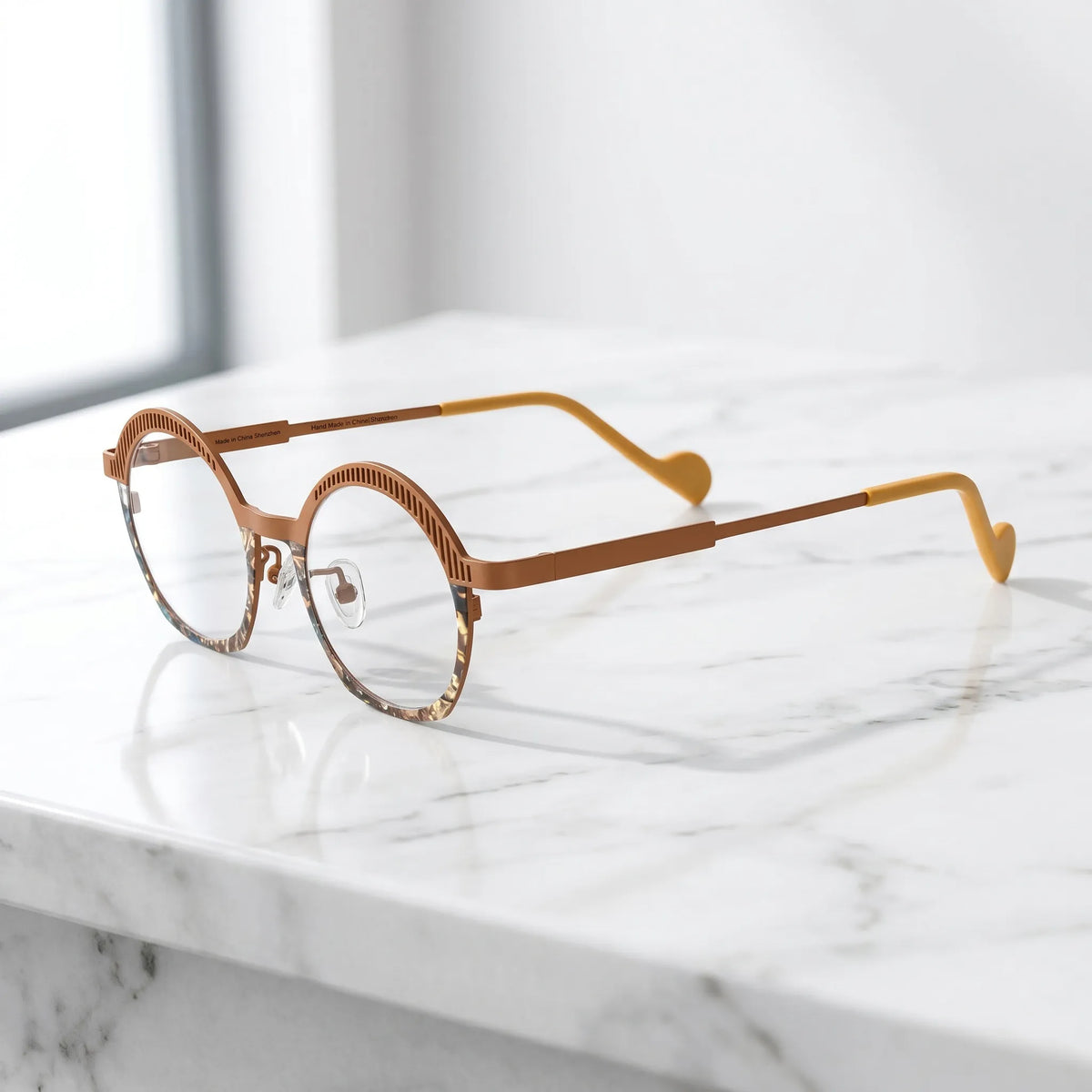 Barledear Amber Mosaic eyeglasses angled side view showing slim temples, clear nose pads, and sculpted slotted browline detail