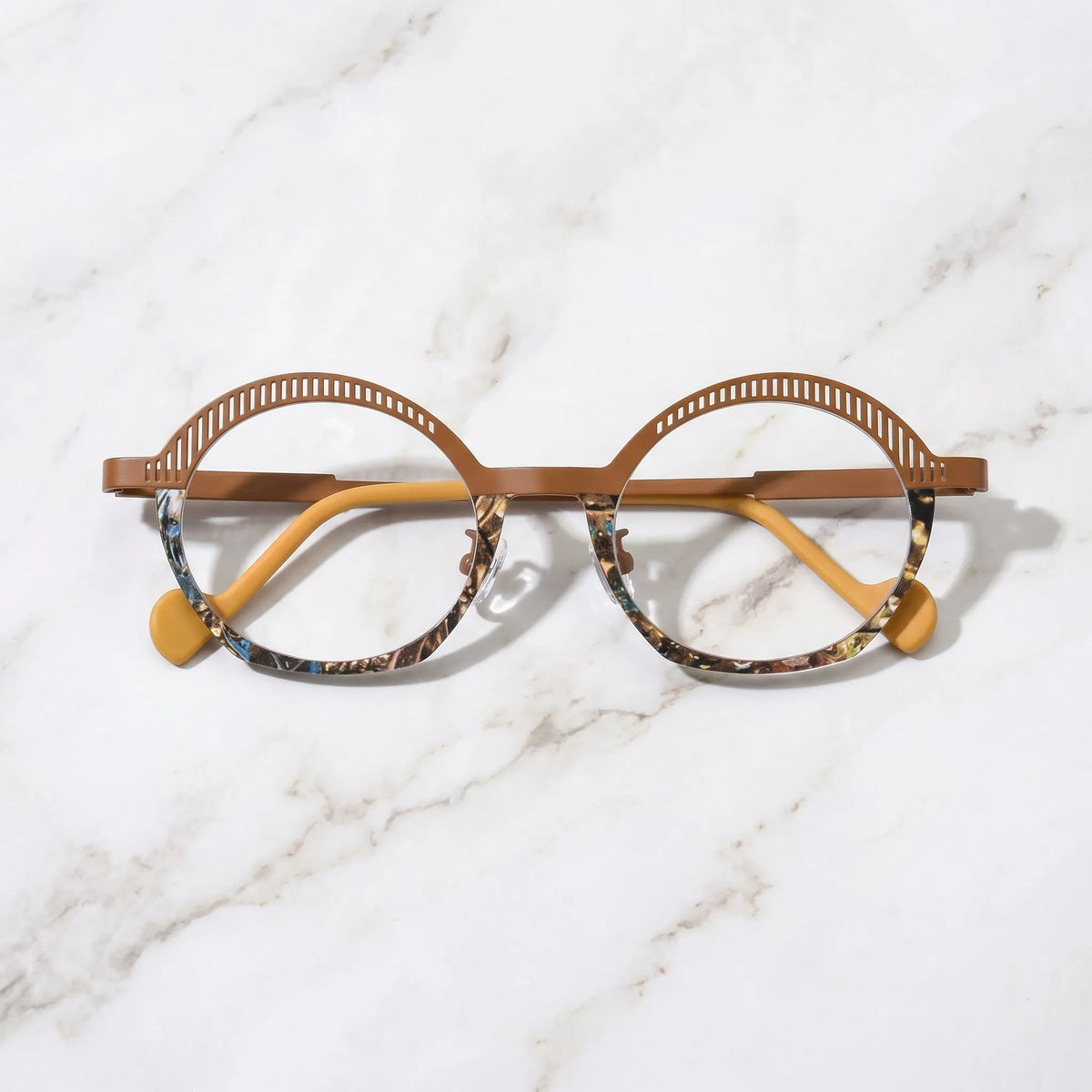Barledear Amber Mosaic eyeglasses folded display showing slim titanium temples, yellow temple tips, and artistic full-rim frame design