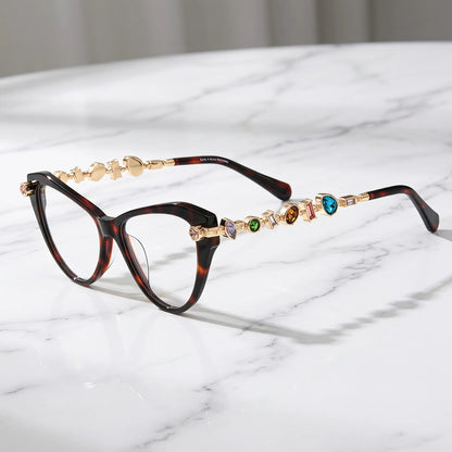 Barledear Amber Tortoise eyeglasses angled side view highlighting multicolor geometric crystal accents along the gold-tone temples