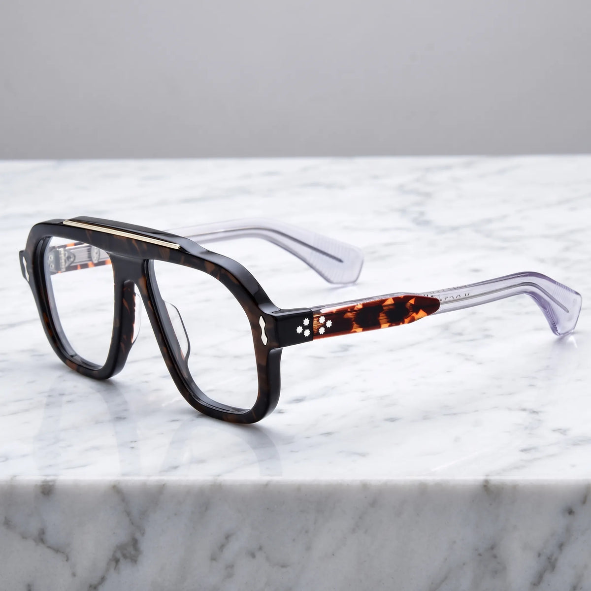 Barledear Amber Tortoise eyeglasses angled side view showing tortoise temple accents, clear temple arms and silver-tone metal inlays