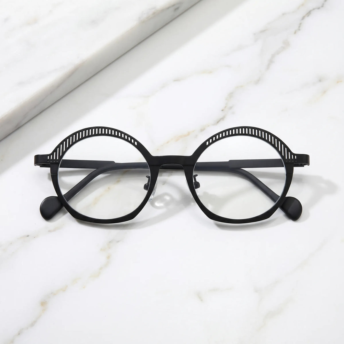 Barledear Charcoal Black eyeglasses folded display showing slim black titanium temples, clear nose pads, and lightweight full-rim design