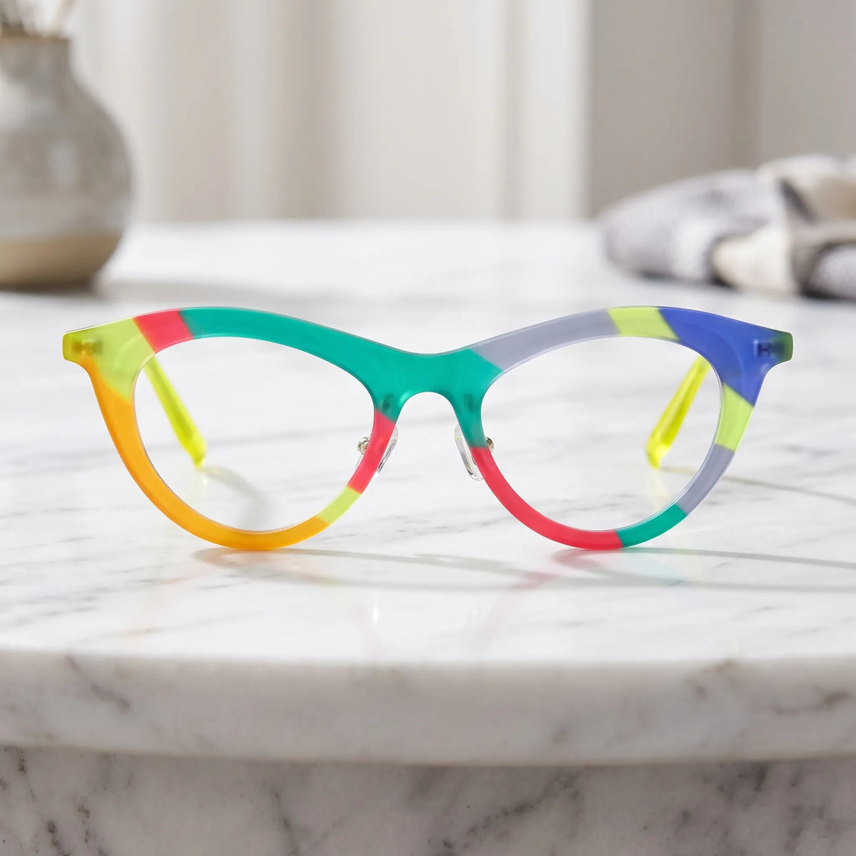 Barledear Citrus Carnival cat-eye acetate eyeglasses shown in a bright lifestyle front view with playful multicolor detailing