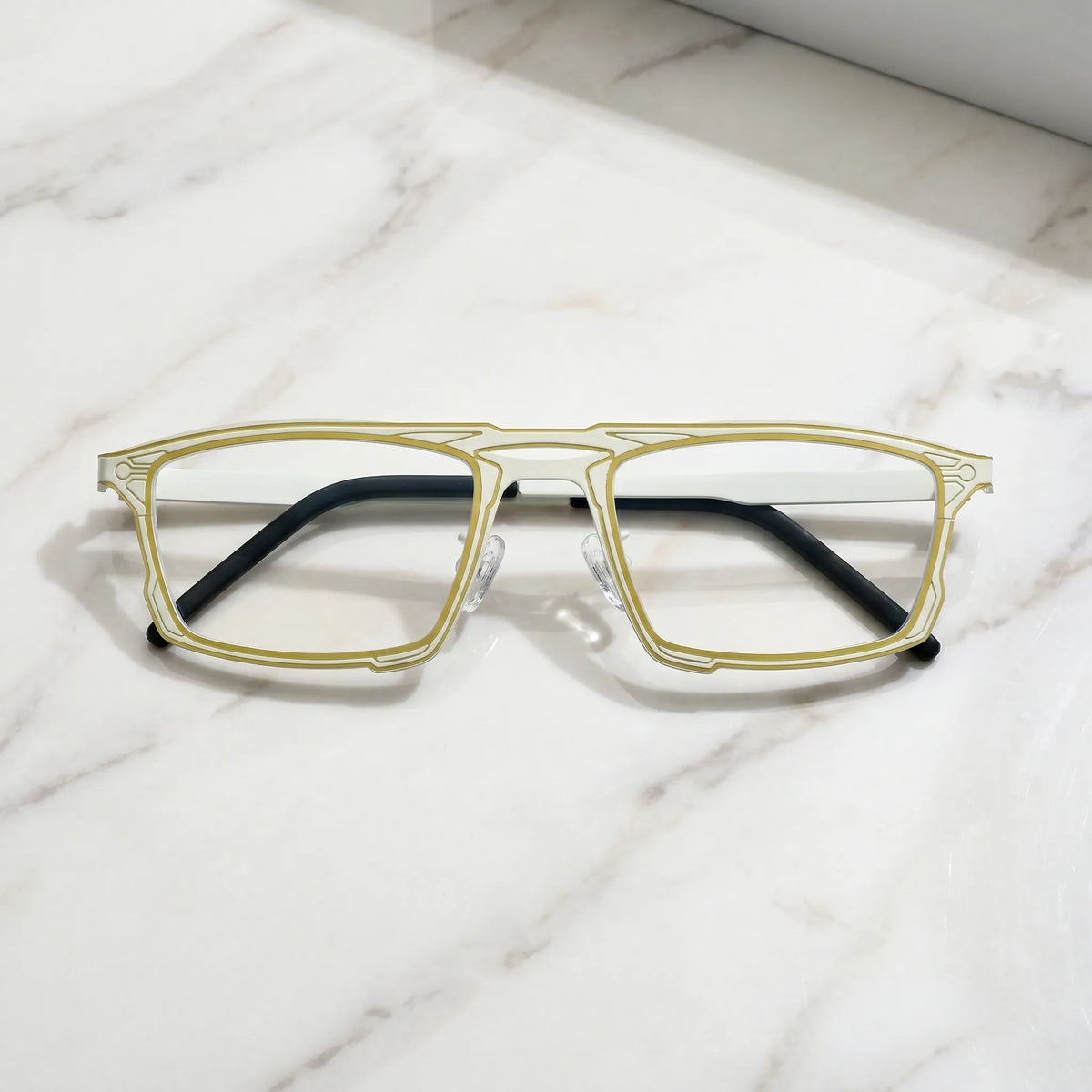 Barledear Citrus Ivory eyeglasses folded display showing slim titanium frame and temple design