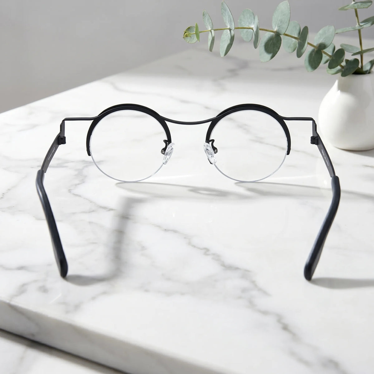 Barledear Classic Noir eyeglasses back view showing adjustable nose pads, slim temples, and comfortable pure titanium frame structure
