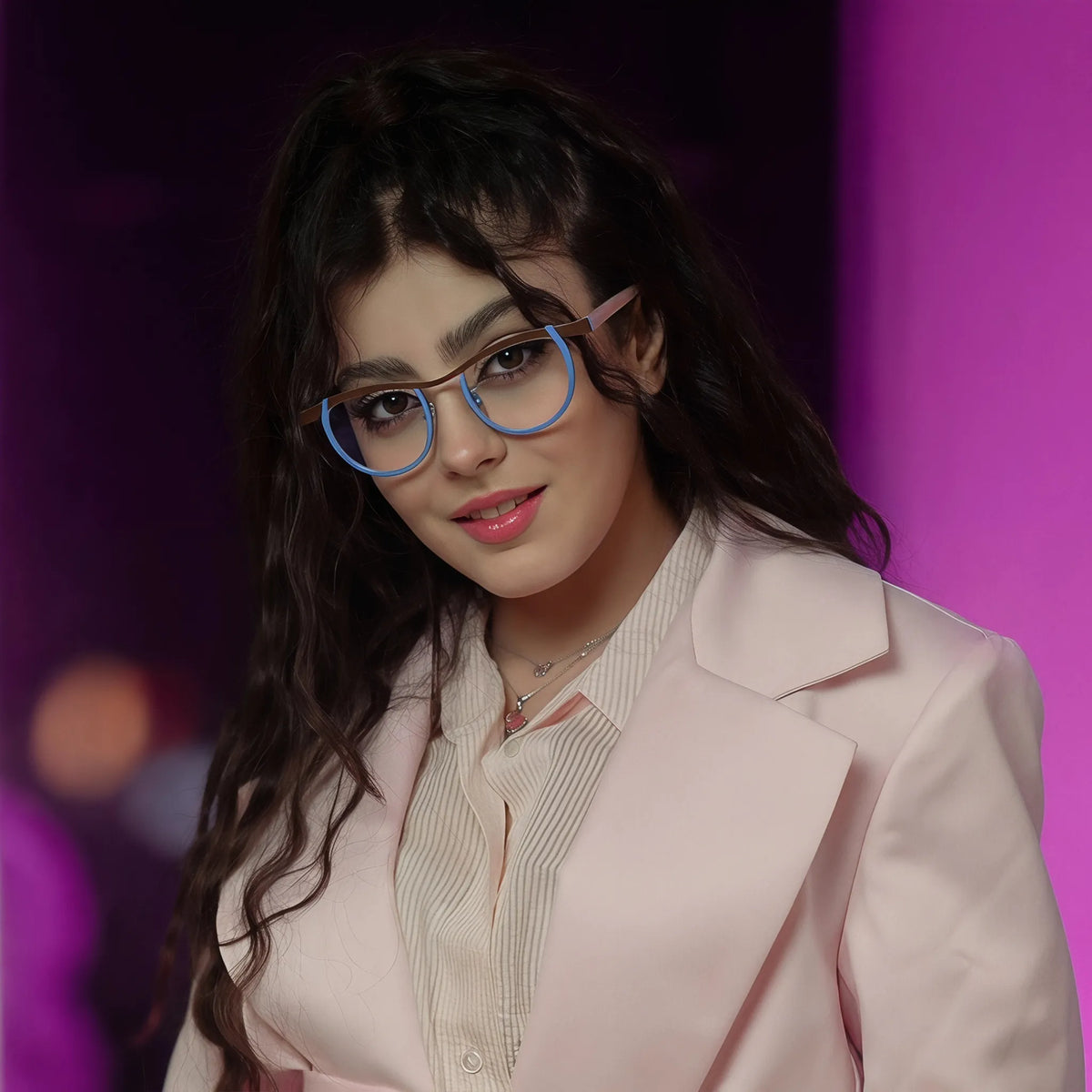 Model wearing Barledear Cocoa Sky Blush eyeglasses in a lifestyle portrait