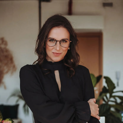 Model wearing Barledear Copper Noir Brown eyeglasses in a lifestyle portrait