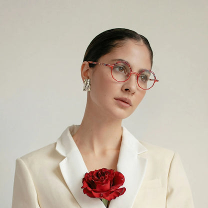 Model wearing Barledear Coral Rouge eyeglasses in a lifestyle portrait