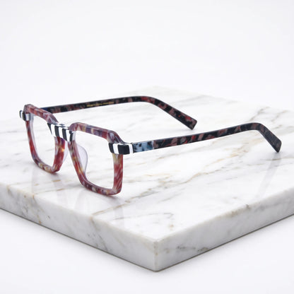 Barledear Crimson Checker Bloom square eyeglasses angled side view showing checkerboard accents and patterned temples