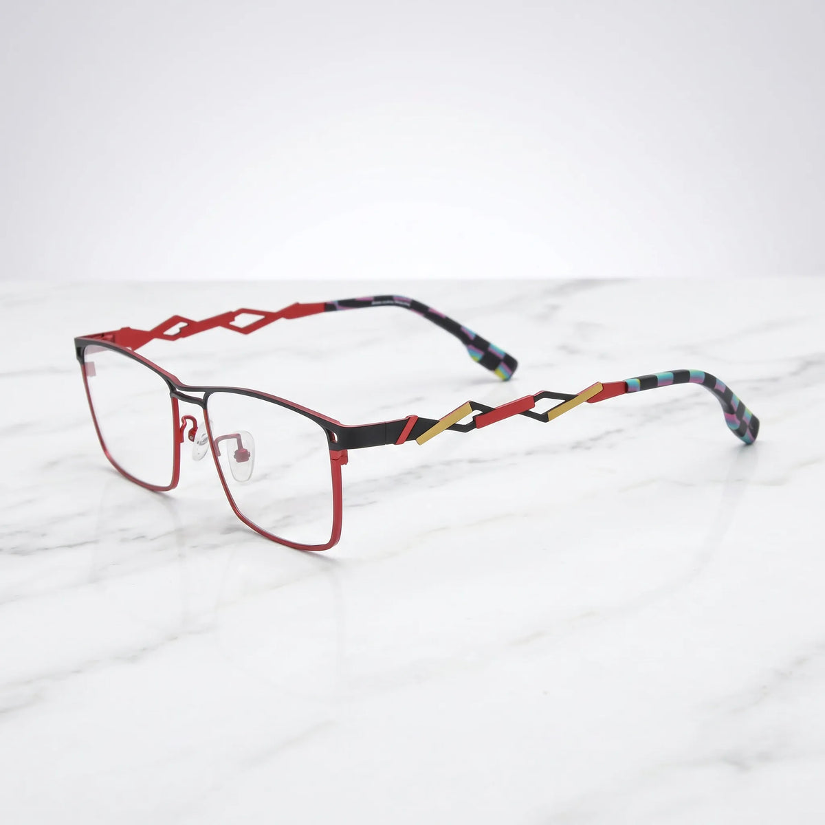 Barledear Crimson Noir eyeglasses angled side view showing hollow geometric temples, bridge detail, and lightweight construction