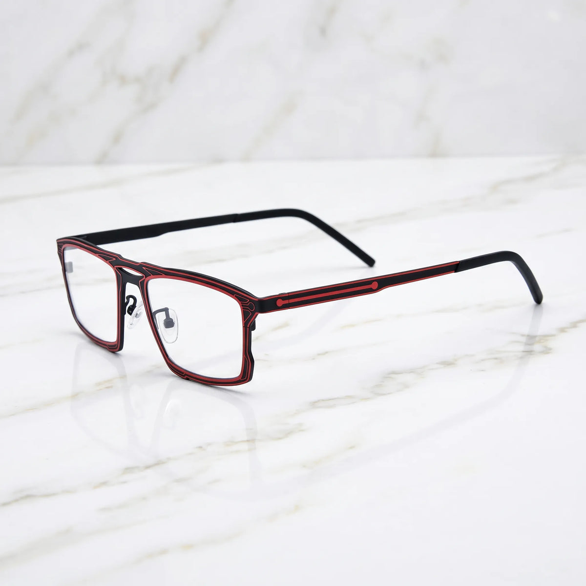 Barledear Crimson Noir eyeglasses angled side view showing slim dual-tone temples, bridge detail, and adjustable nose pads