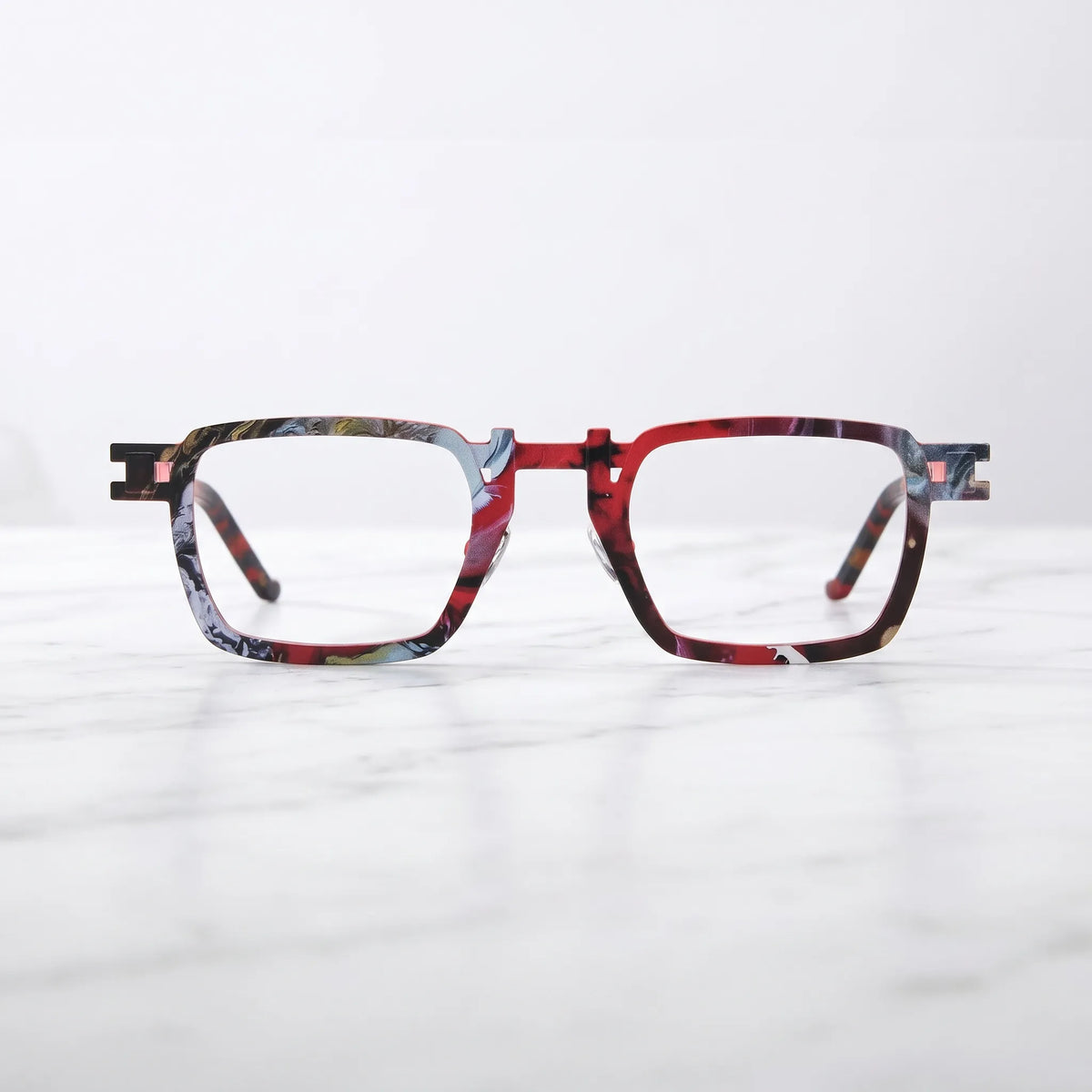 Barledear Crimson Noir Mosaic eyeglasses shown in a clean lifestyle front view with red black patterned square frame for prescription eyewear