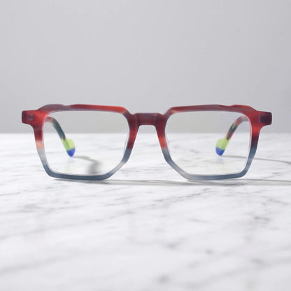 Barledear Crimson Smoke eyeglasses shown in a clean lifestyle setting with a red and gray geometric frame