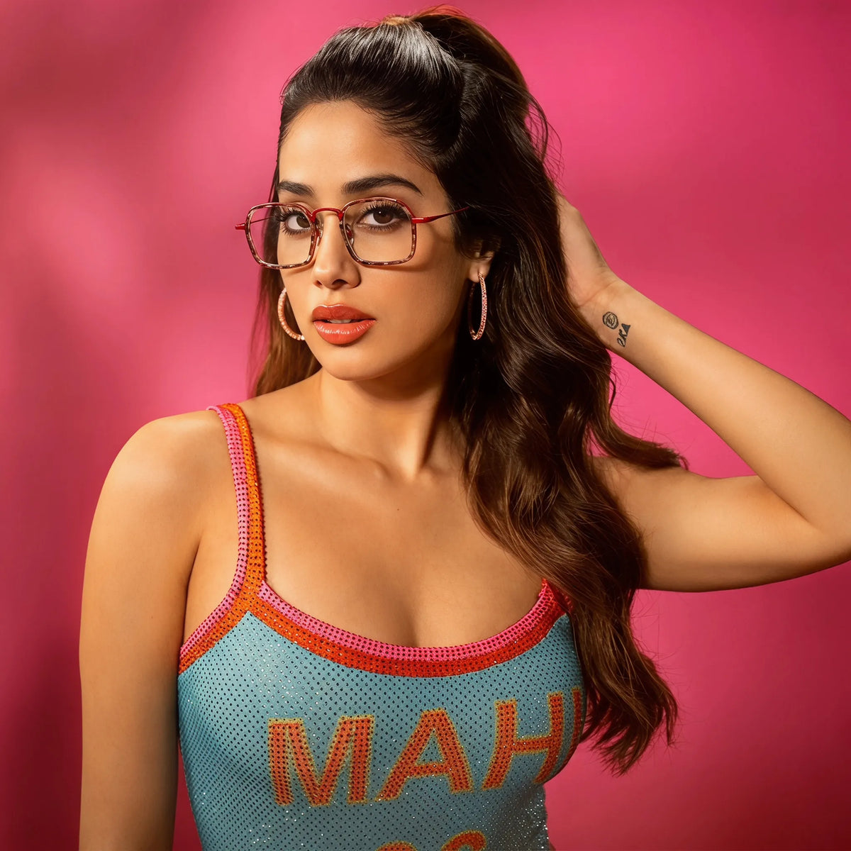 Model wearing Barledear Crimson Tortoise Red eyeglasses in a lifestyle portrait