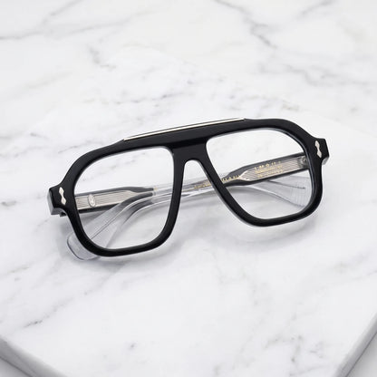 Barledear Crystal Noir eyeglasses folded display showing the polished black acetate front, transparent temples and decorative metal details