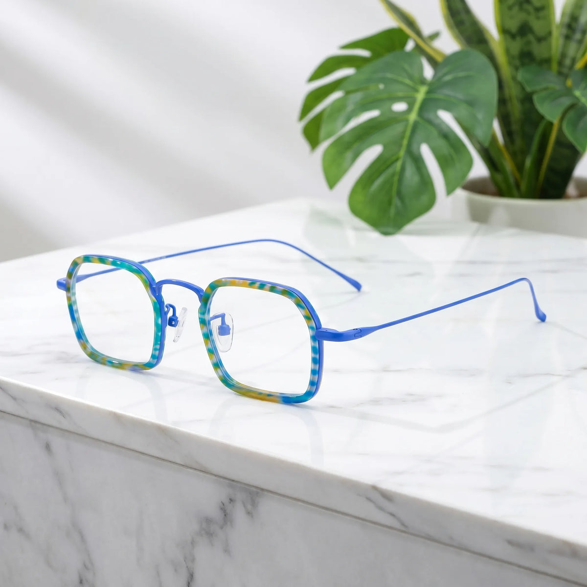 Barledear Electric Mosaic Blue eyeglasses angled side view showing slim titanium temples and bridge detail