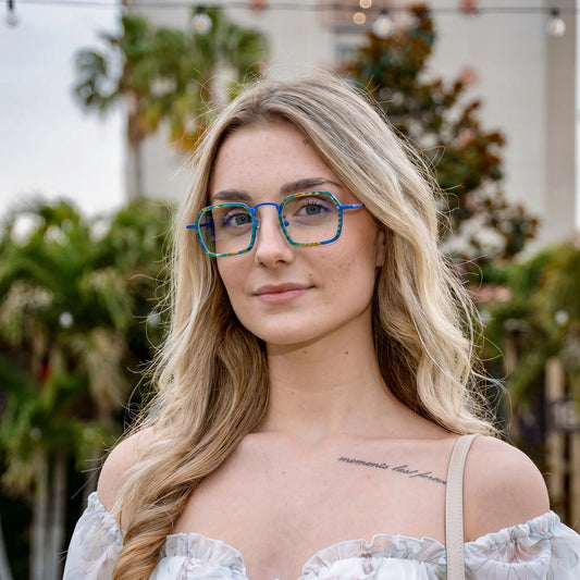 Model wearing Barledear Electric Mosaic Blue eyeglasses in a lifestyle portrait