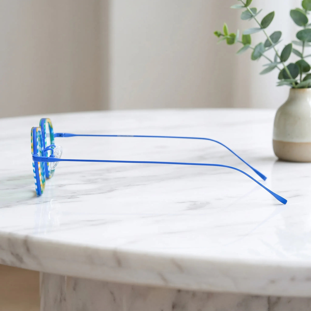 Barledear Electric Mosaic Blue eyeglasses angled side view showing slim titanium temples and bridge detail