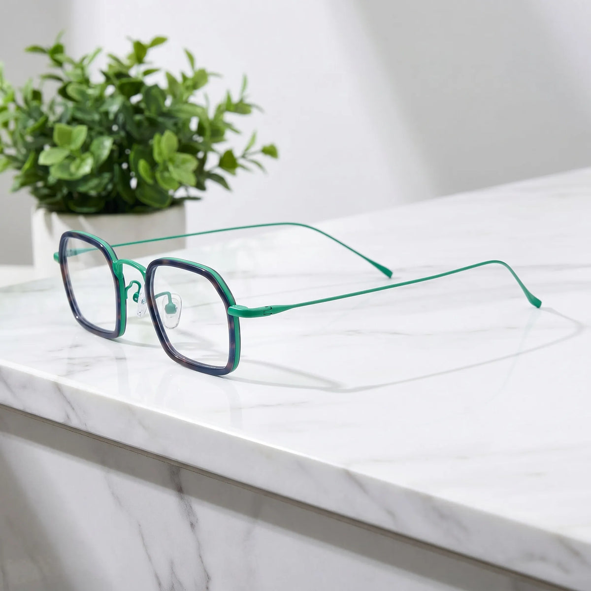 Barledear Emerald Graphite Green eyeglasses angled side view showing slim titanium temples and bridge detail
