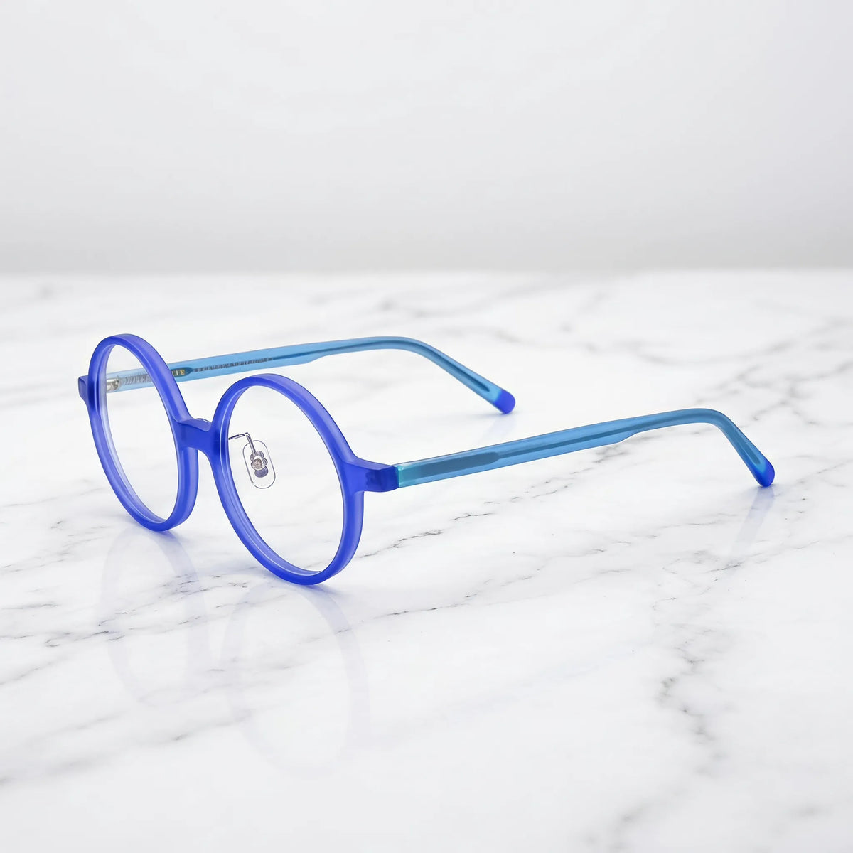 Barledear Frosted Iris Blue round acetate eyeglasses angled side view showing slim acetate temples, bridge detail, and adjustable nose pads