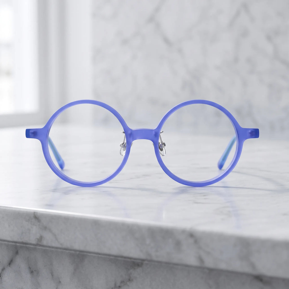 Barledear Frosted Iris Blue round acetate eyeglasses shown in a clean lifestyle front view with blue frame and light blue temples