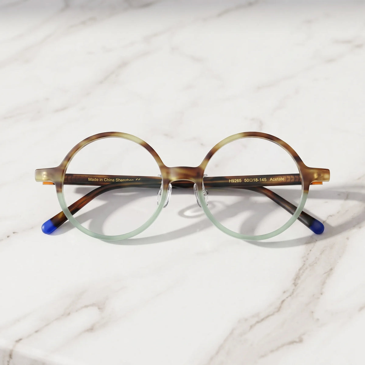 Barledear Frosted Sage Tortoise round acetate eyeglasses folded display showing frame shape, slim temples, and contrast temple tips