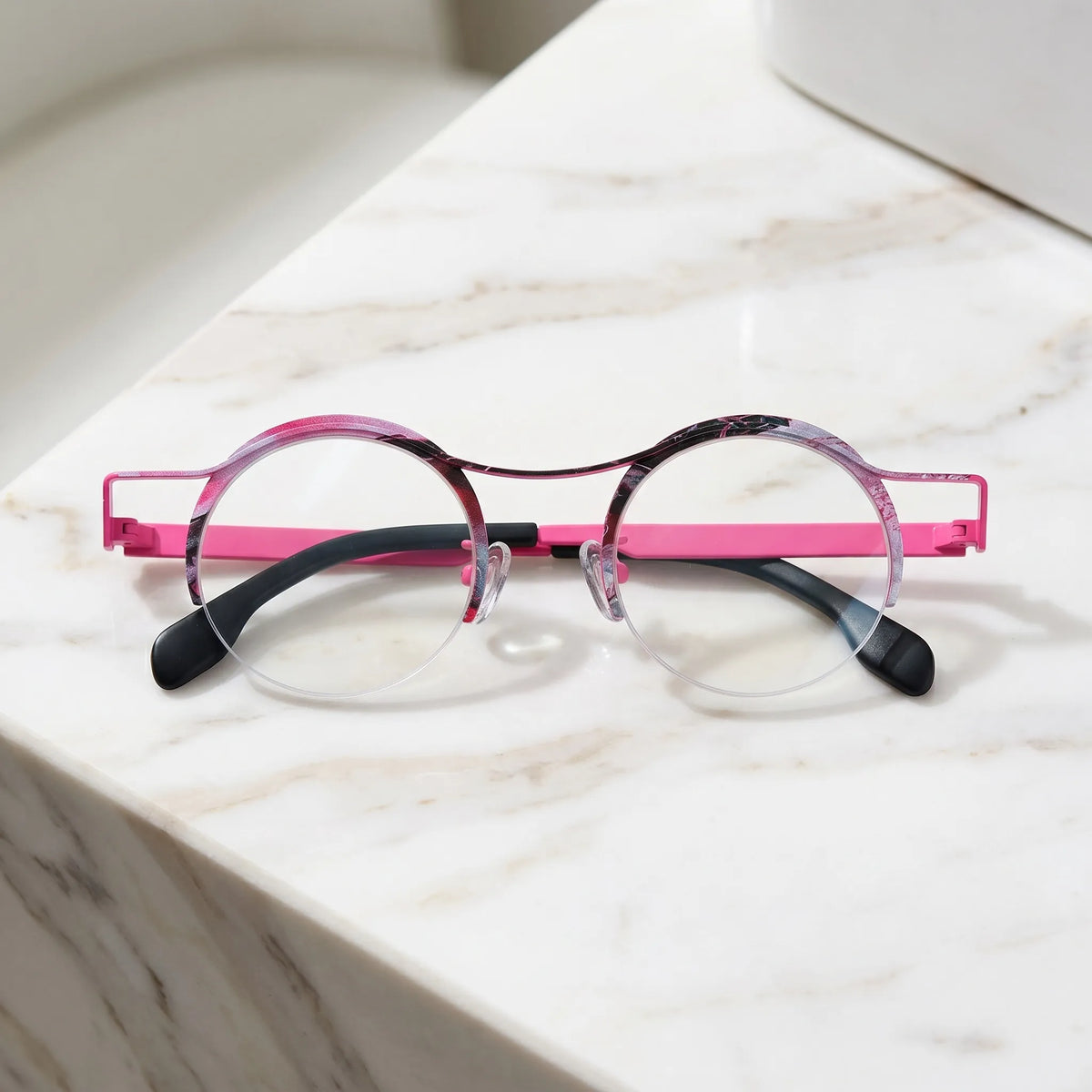 Barledear Fuchsia Marble eyeglasses folded display showing slim pure titanium temples and artistic color-spliced details