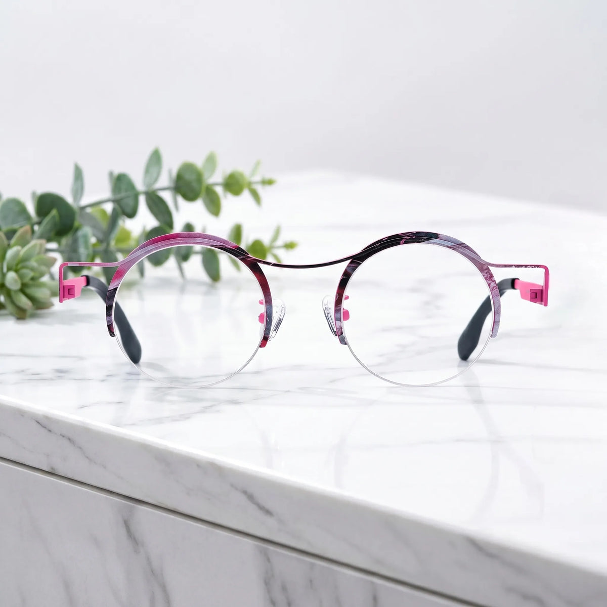 Barledear Fuchsia Marble eyeglasses shown in a clean lifestyle front view with retro round semi-rimless pure titanium frame