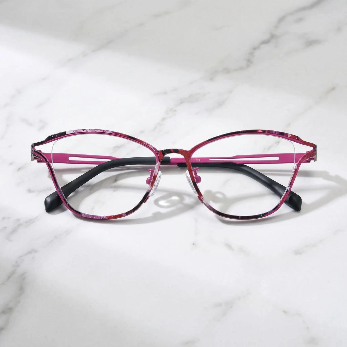 Barledear Fuchsia Mosaic eyeglasses folded display showing slim titanium frame and black temple tips