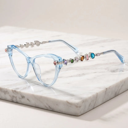Barledear Glacier Blue eyeglasses angled side view highlighting multicolor geometric crystal accents along the silver-tone temples
