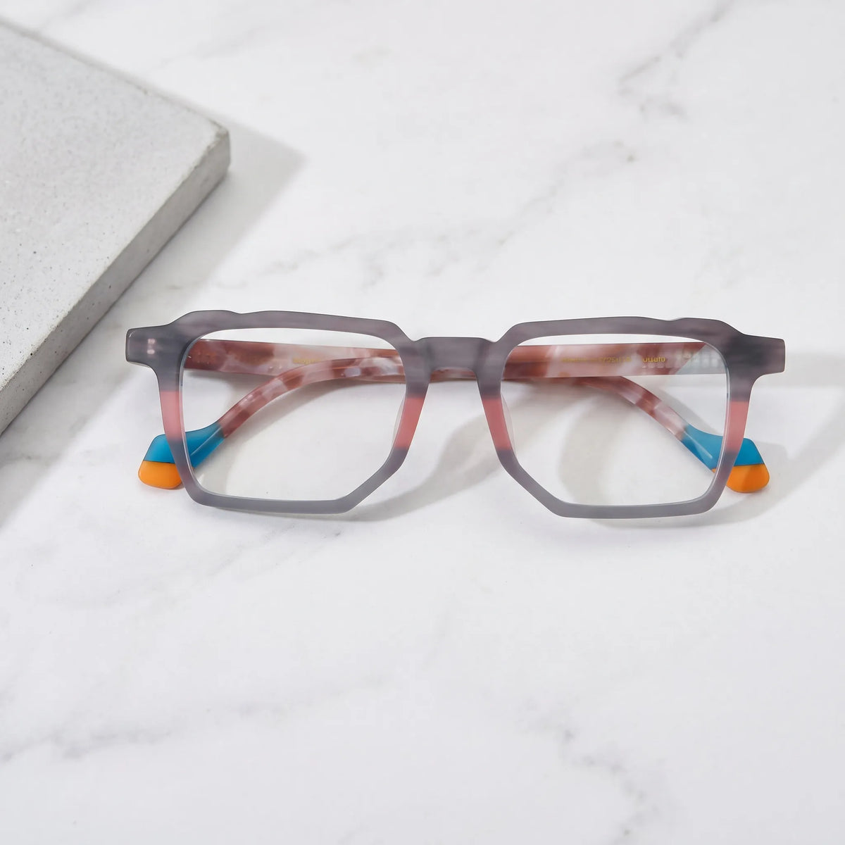 Barledear Graphite Blush eyeglasses folded display showing the matte square frame and patterned acetate temples