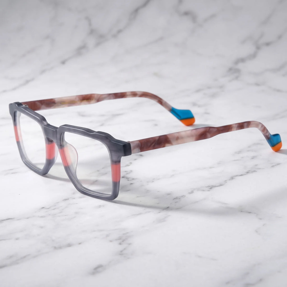 Barledear Graphite Blush eyeglasses angled side view showing translucent marbled temples and blue orange temple tips
