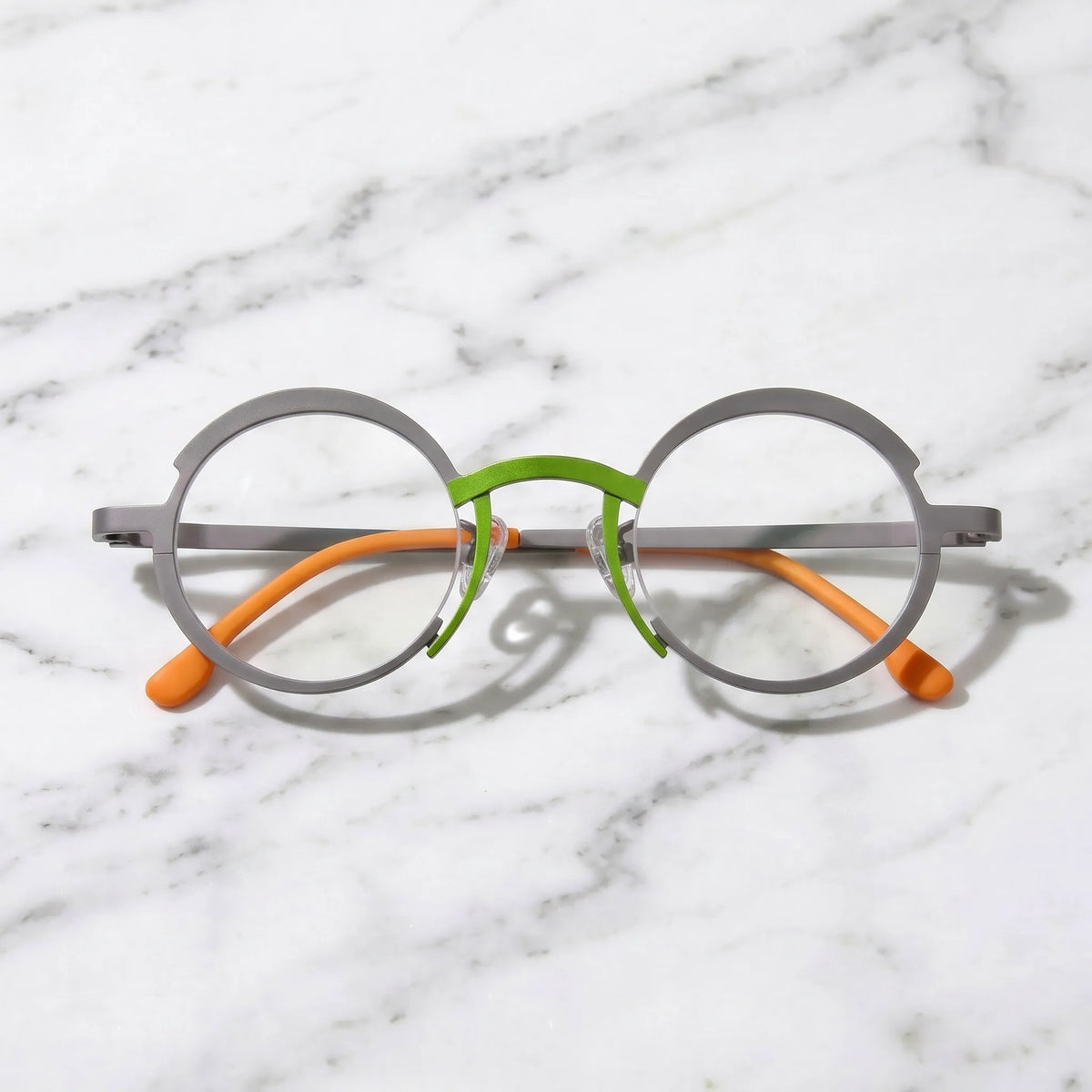 Barledear Graphite Gray Citrus Orange eyeglasses folded display showing the lightweight full-rim structure, slim titanium temples, and temple-tip details