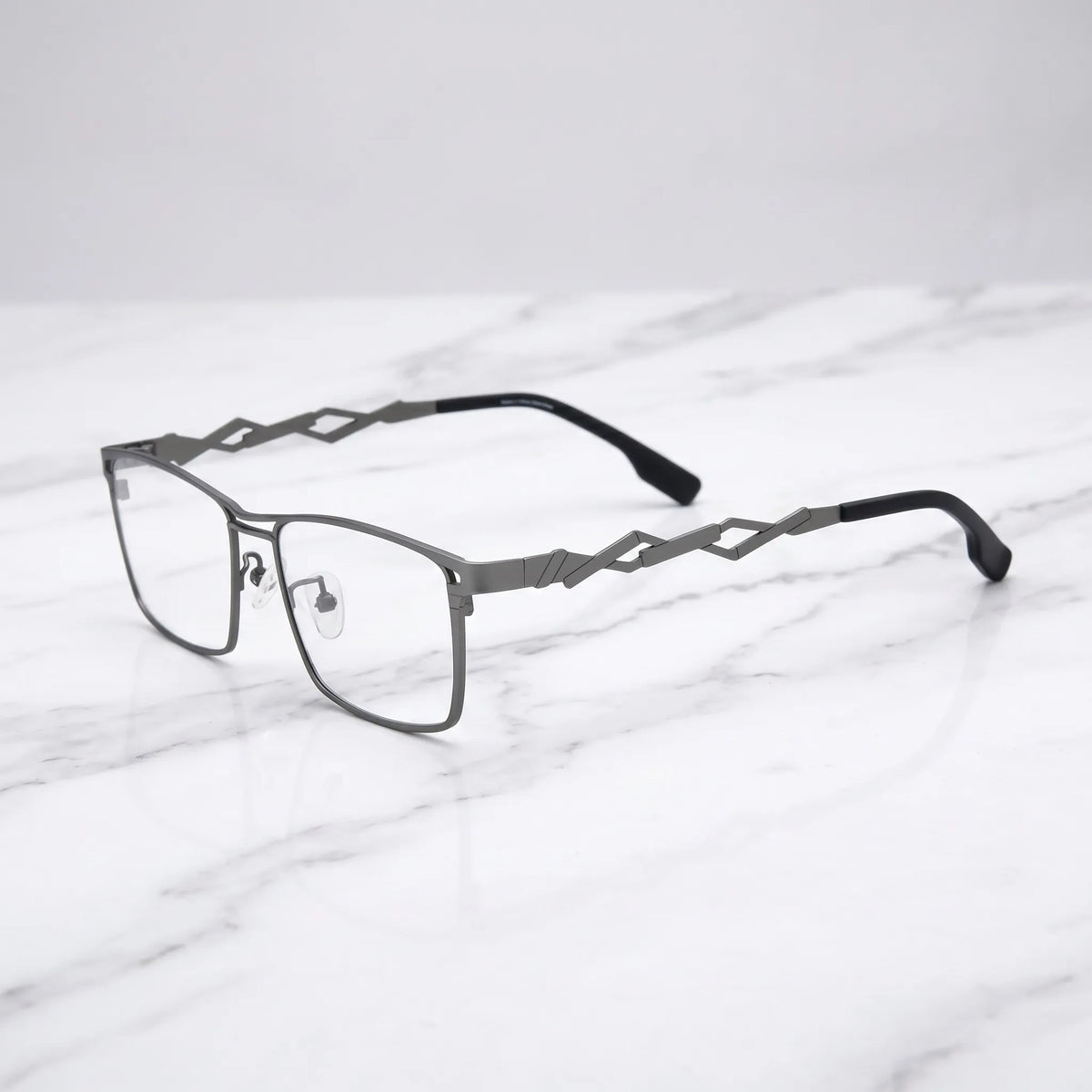 Barledear Graphite Gunmetal eyeglasses angled side view showing geometric cutout temples and lightweight metal structure