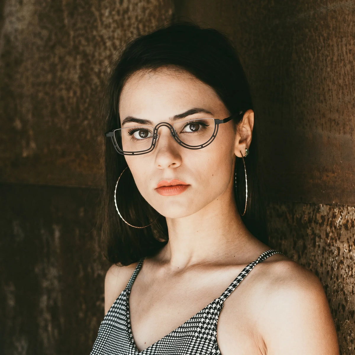 Model wearing Barledear Graphite Mosaic Black eyeglasses in a lifestyle portrait